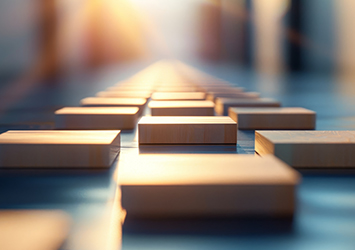 Close up of wooden blocks laid out in a grid formation